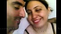 Arab beauty stirs in bed’s embrace.
